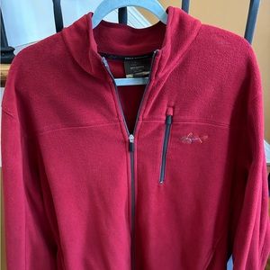 Greg Norman soft Fleece jacket - like new- maroon color, 3 pockets and classy.